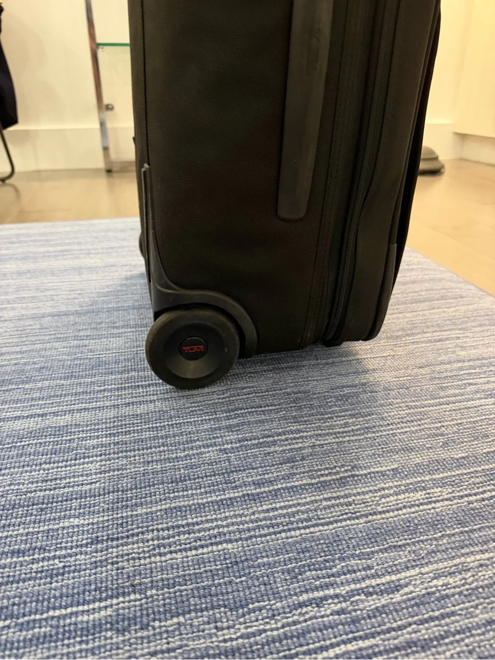 Tumi Black Softside Carry-On with Front Zip Pocket